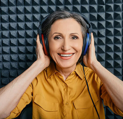 Woman wearing headphones during hearing test