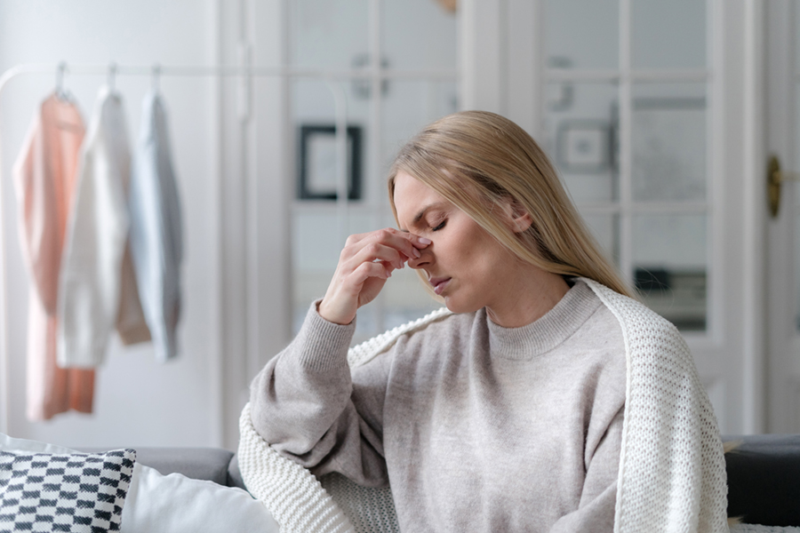 woman suffering from rhinitis